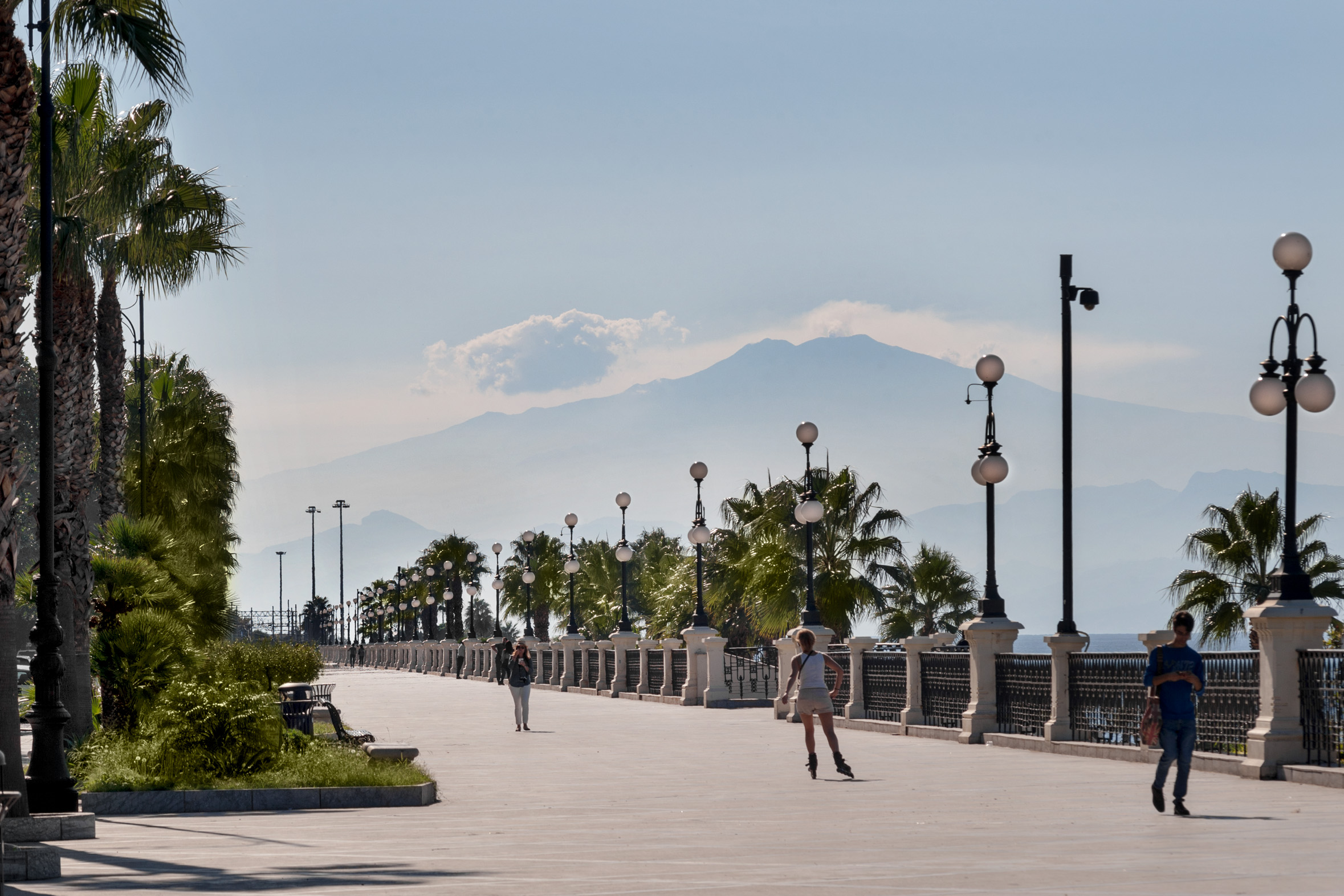 Reggio Calabria lungomare with the Sicilian coast in the distance